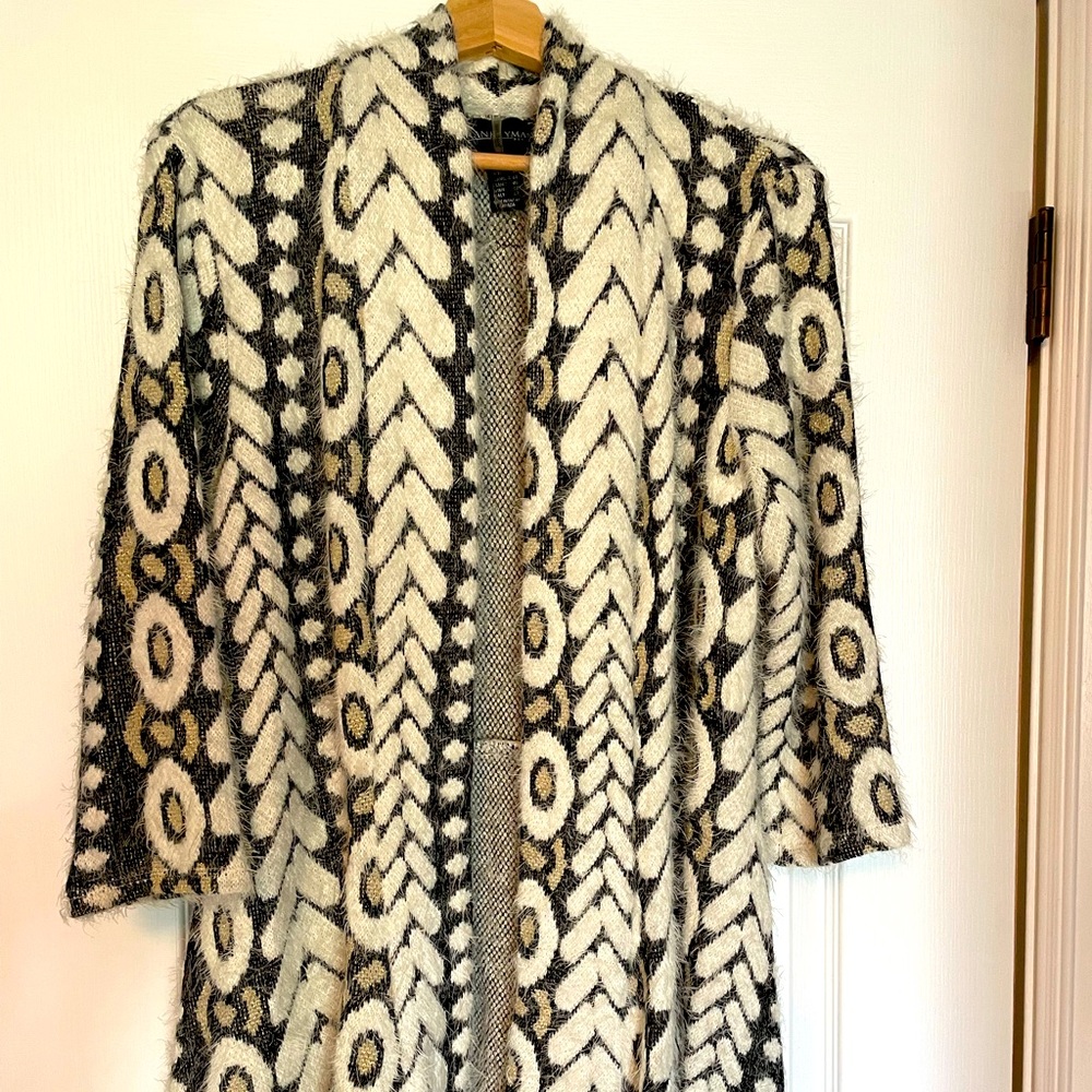 Frank Lyman snake pattern sweater.